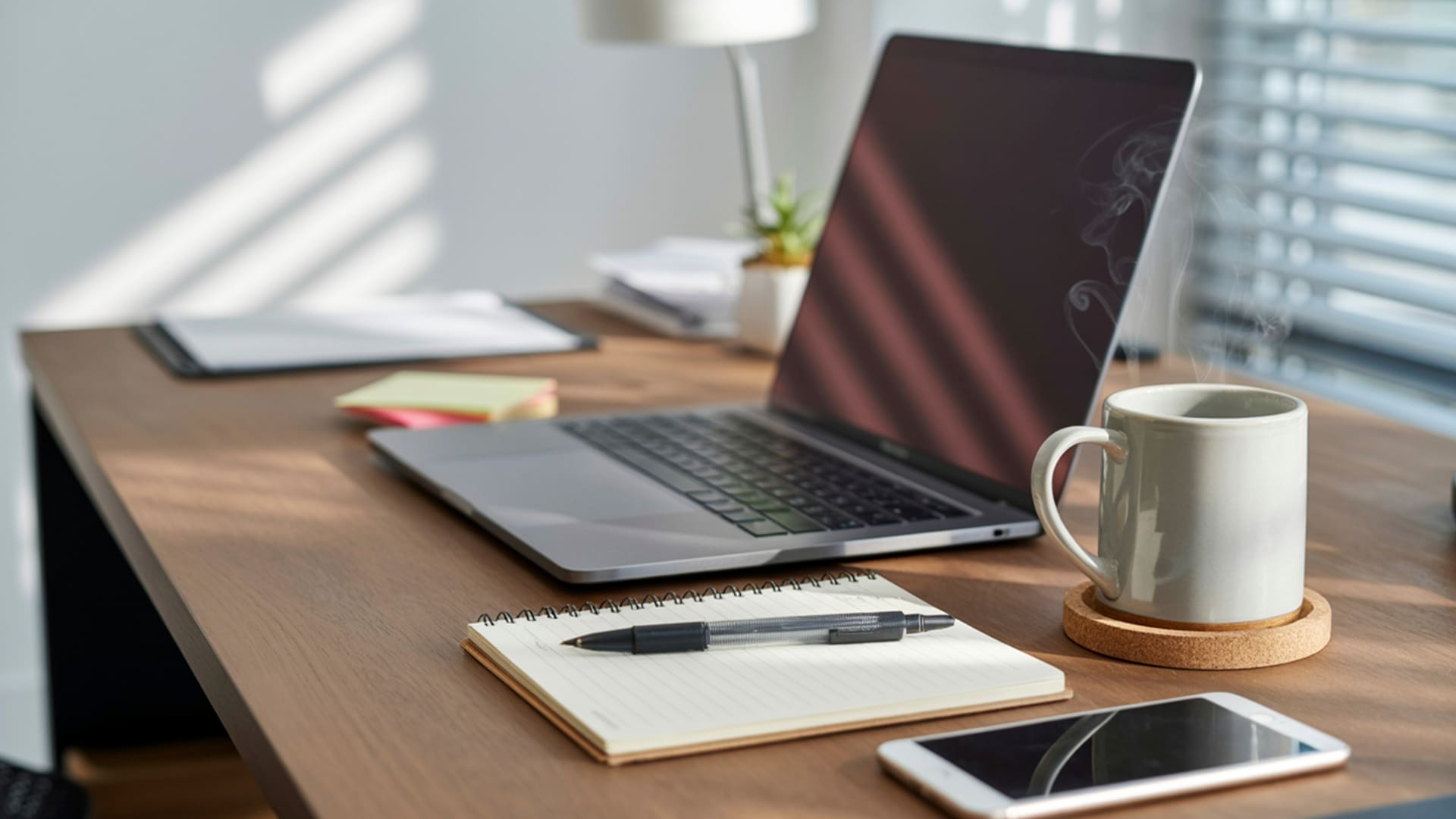 This clean desktop represents the calm that organized, current books gives to a business owner.